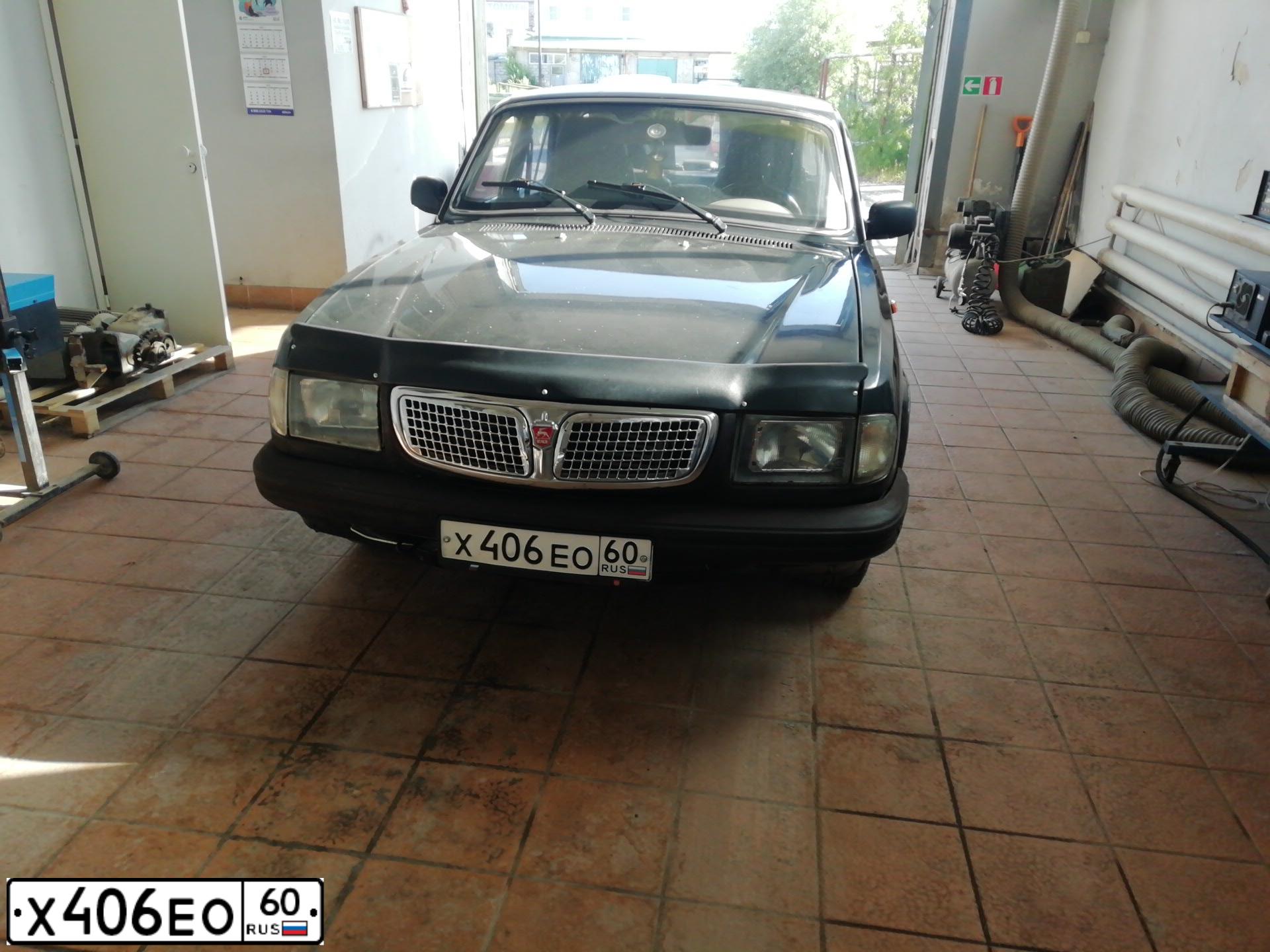 Фото автомобиля GAZ 3110 WOLGA, 1997 — госномер Х406ЕО60. Цвет: ЧЕРНЫЙ