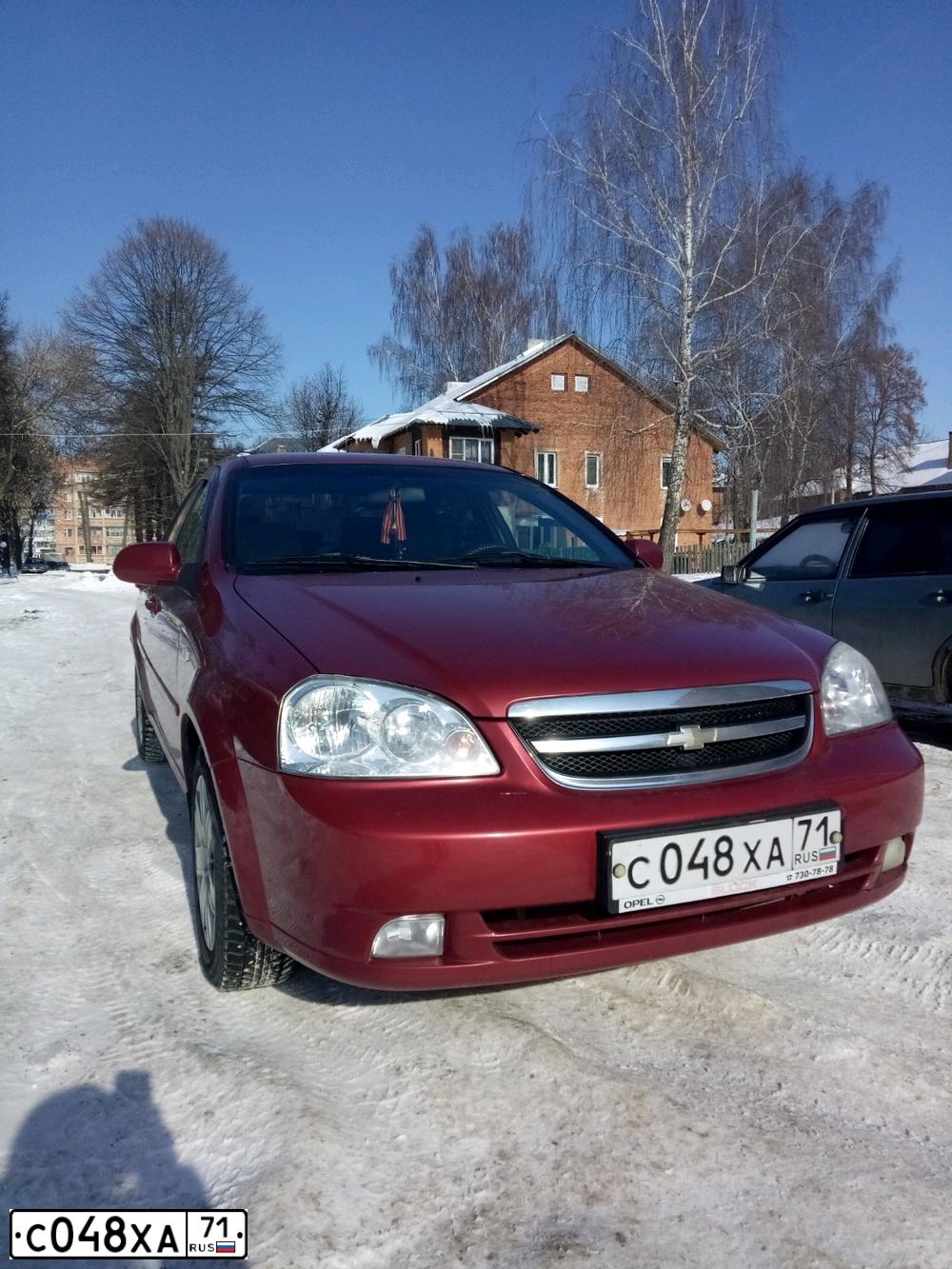 Фото автомобиля CHEVROLET LACETTI, 2008 — госномер С048ХА71. Цвет: КРАСНЫЙ