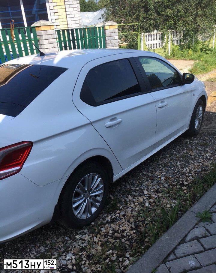 Фото автомобиля PEUGEOT 301, 2013 — госномер К220МС21. Цвет: Белый