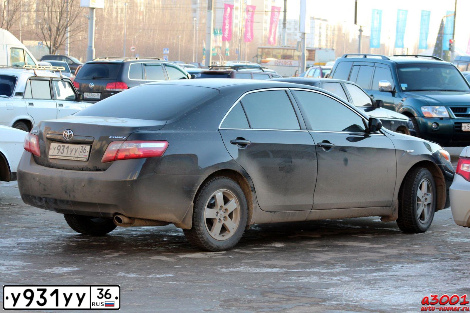 Фото автомобиля TOYOTA CAMRY, 2008 — госномер А110МР36. Цвет: ЧЕРНЫЙ