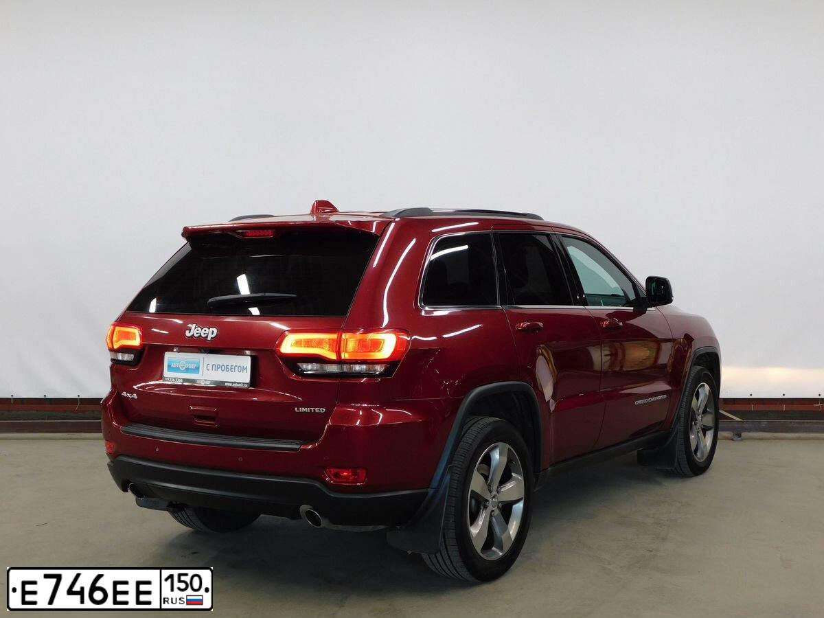 Фото автомобиля JEEP GRAND CHEROKEE, 2013 — госномер М588МР702. Цвет: ТЕМНО-КРАСНЫЙ