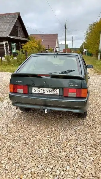 Фото автомобиля LADA 2114 SAMARA, 2009 — госномер Х516УМ59. Цвет: СЕРО-СИНЕ-ЗЕЛЕНЫЙ