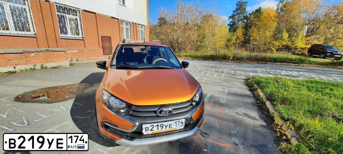 Фото автомобиля LADA 2194 KALINA, 2019 — госномер В219УЕ174. Цвет: ЗОЛОТИСТО-ОРАНЖЕВЫЙ