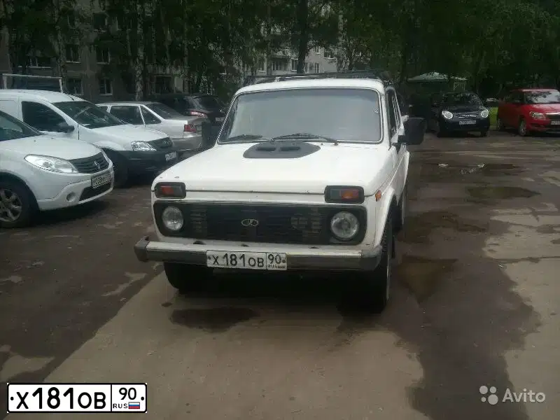 Фото автомобиля LADA 2121 NIVA, 1995 — госномер К456ЕЕ50. Цвет: Белый