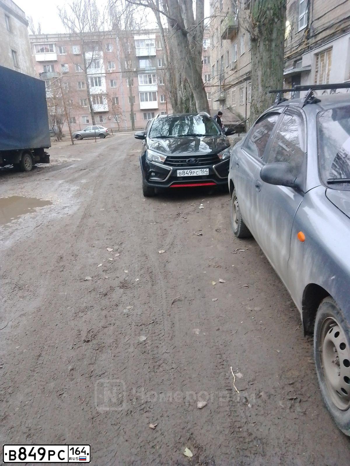 Фото автомобиля LADA VESTA, 2019 — госномер В849РС164. Цвет: ЧЕРНЫЙ