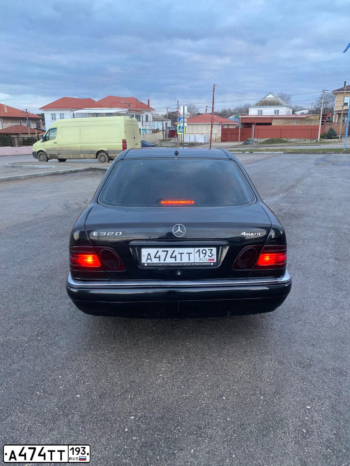Фото автомобиля MERCEDES E-KLASSE, 1999 — госномер М150ХТ82. Цвет: ЧЕРНЫЙ