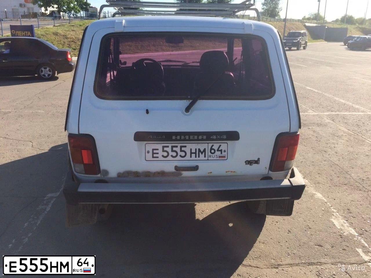 Фото автомобиля LADA NIVA, 2000 — госномер К737ТЕ164. Цвет: ЯРКО-БЕЛЫЙ