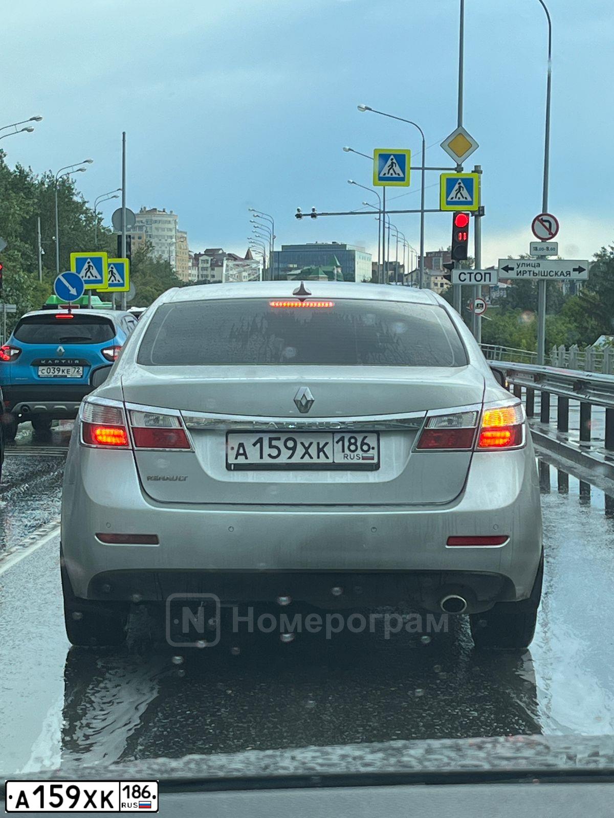 Фото автомобиля RENAULT LATITUDE, 2010 — госномер А159ХК186. Цвет: СВЕТЛО-СЕРЫЙ