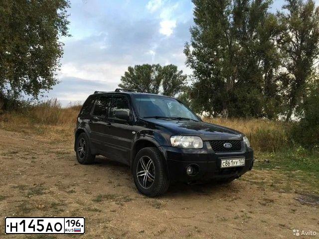 Фото автомобиля FORD MAVERICK, 2006 — госномер Х971КН72. Цвет: ЧЕРНЫЙ
