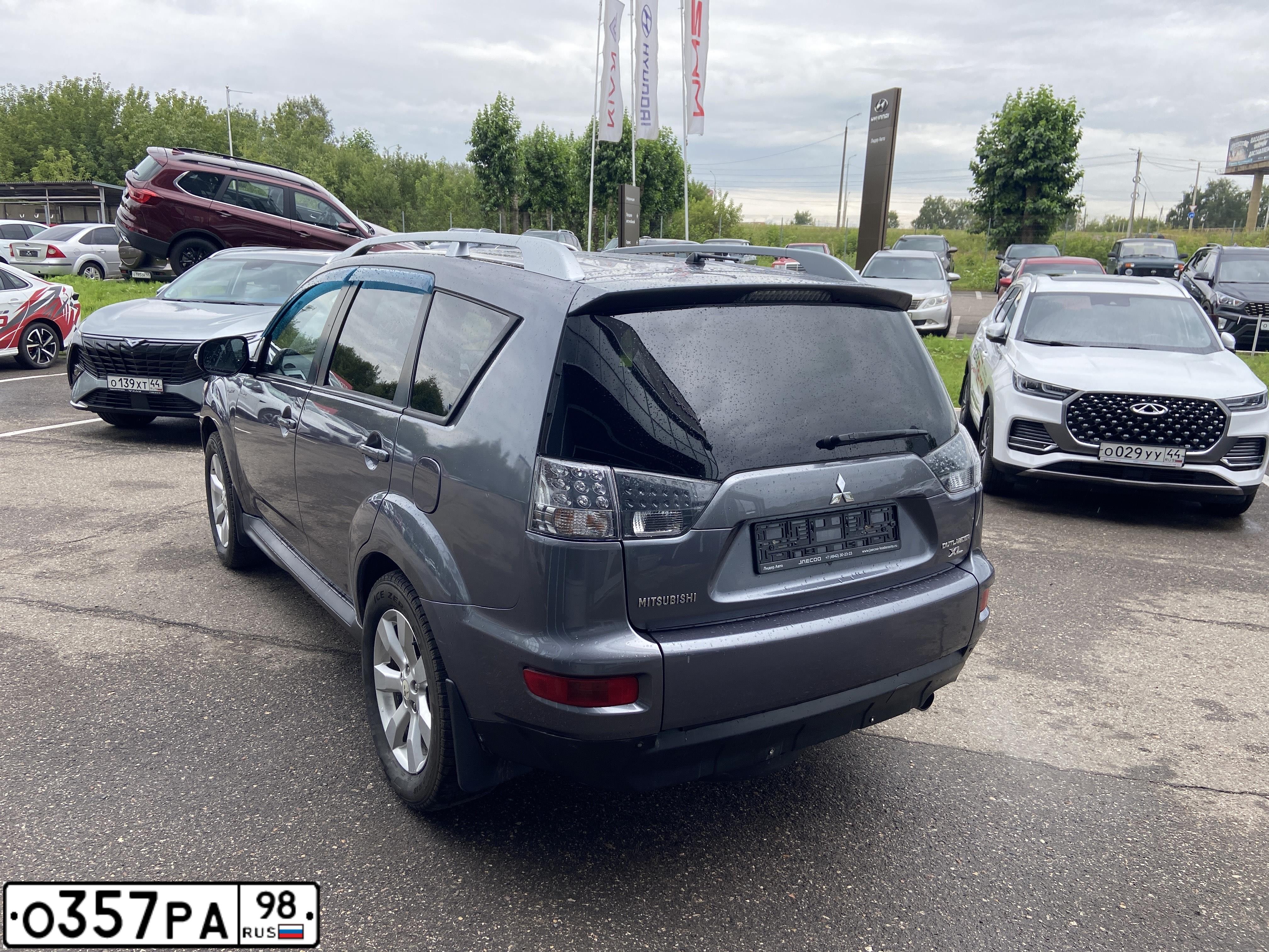 Фото автомобиля MITSUBISHI OUTLANDER, 2010 — госномер О906ХЕ44. Цвет: СЕРЫЙ