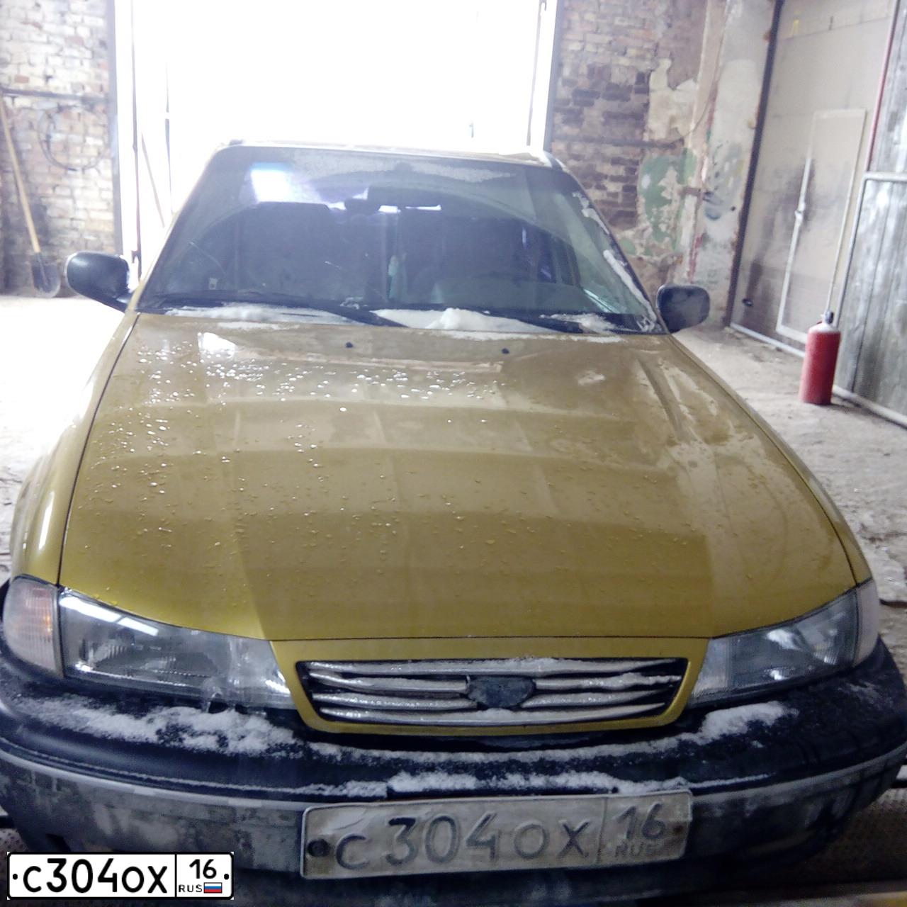 Фото автомобиля DAEWOO NEXIA, 2003 — госномер С304ОХ16. Цвет: ЗОЛОТИСТО-ЖЕЛТЫЙ
