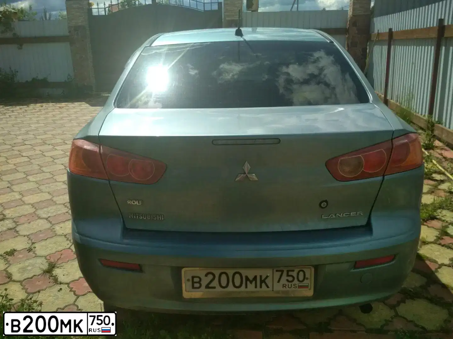 Фото автомобиля MITSUBISHI LANCER, 2007 — госномер Р730ХТ799. Цвет: СВЕТЛО-СЕРО-ЗЕЛЕНЫЙ