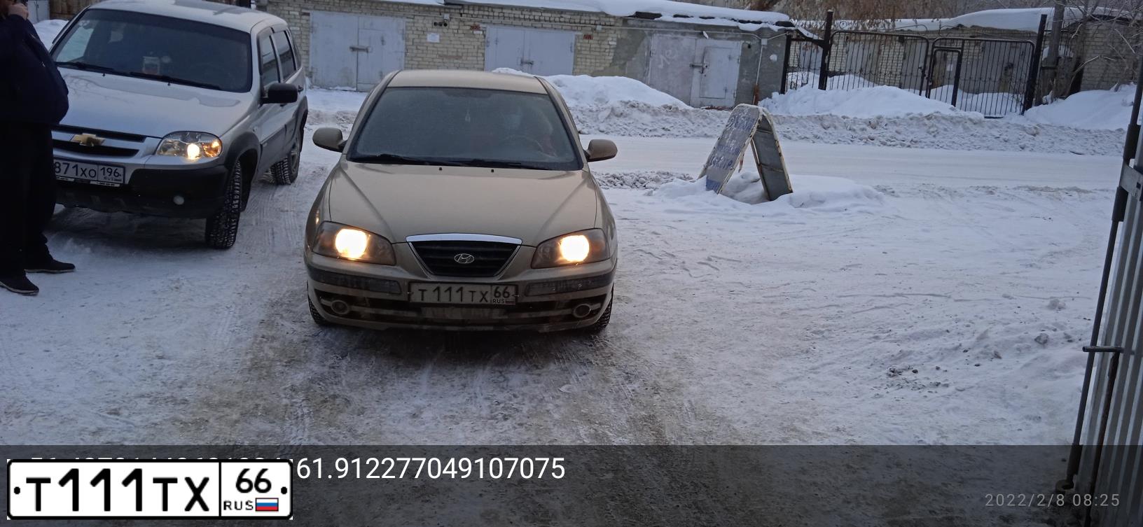 Фото автомобиля HYUNDAI I ELANTRA, 2005 — госномер Т111ТХ66. Цвет: СВЕТЛО-КОРИЧНЕВЫЙ