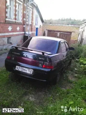 Фото автомобиля LADA 2110 LADA, 2005 — госномер В212МН152. Цвет: ТЕМНО-ЗЕЛЕНЫЙ