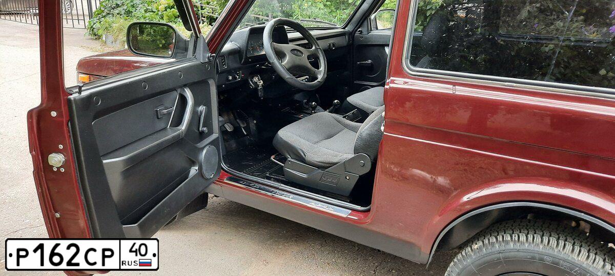 Фото автомобиля LADA NIVA, 2012 — госномер В869СМ57. Цвет: ТЕМНО-ВИШНЕВЫЙ
