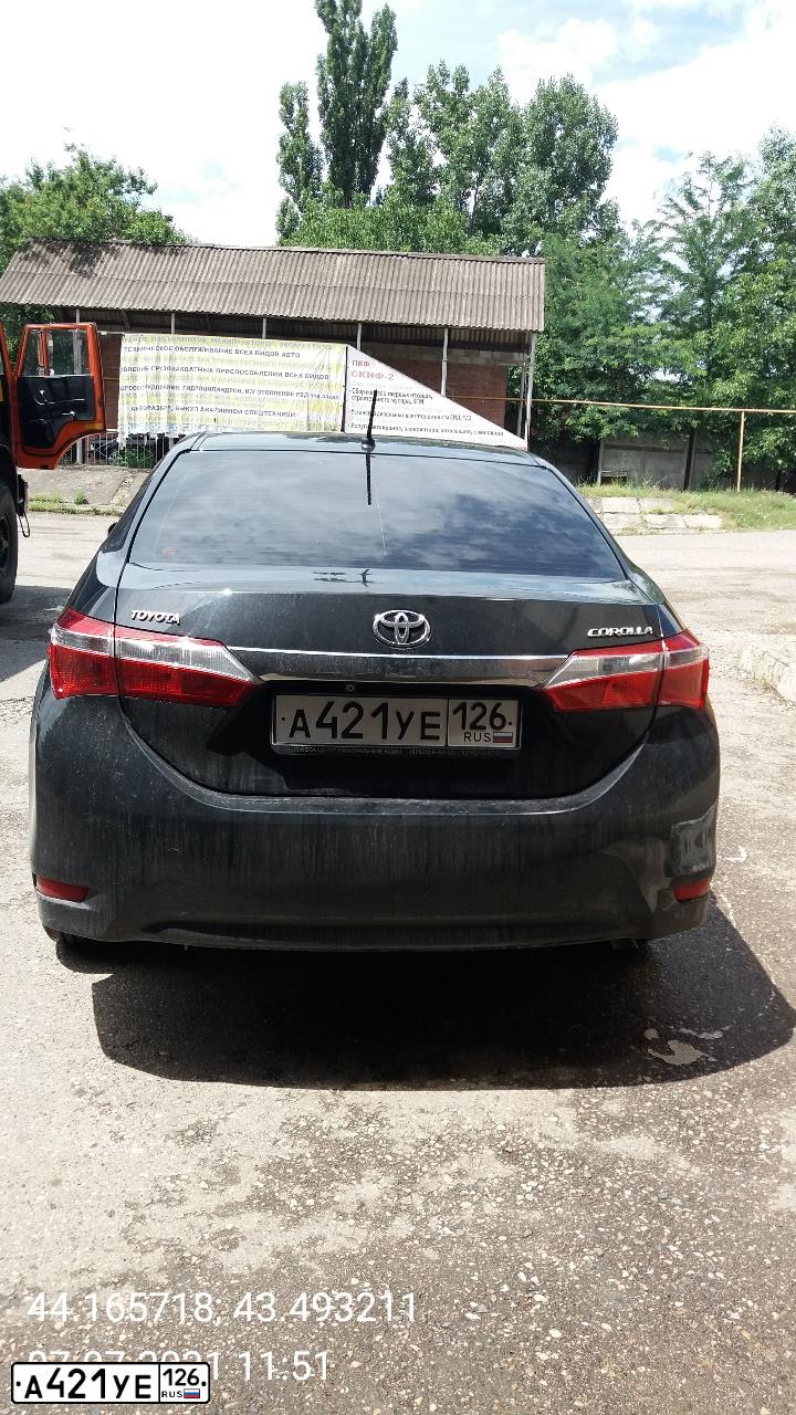 Фото автомобиля TOYOTA COROLLA, 2014 — госномер А421УЕ126. Цвет: ЧЕРНЫЙ