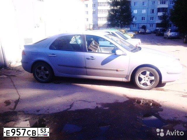 Фото автомобиля RENAULT LAGUNA, 2002 — госномер Е957СВ53. Цвет: СЕРО-ГОЛУБОЙ