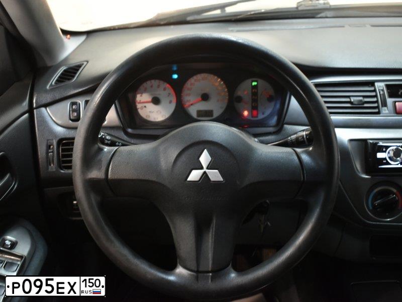 Фото автомобиля MITSUBISHI LANCER, 2007 — госномер Р499ТВ790. Цвет: ЧЕРНЫЙ