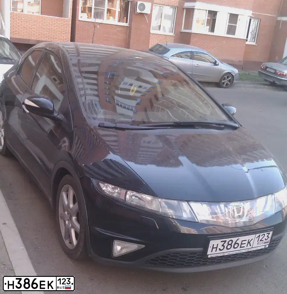 Фото автомобиля FORD FOCUS, 2008 — госномер Н396ЕК123. Цвет: Белый