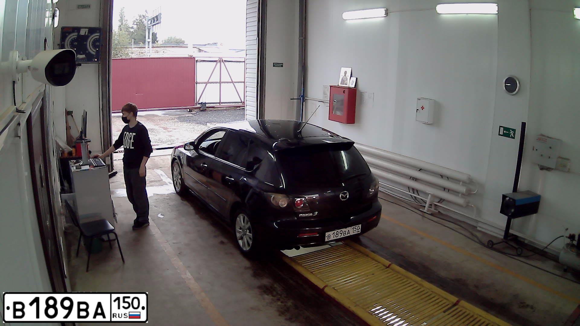 Фото автомобиля MAZDA A 3, 2006 — госномер В189ВА150. Цвет: ЧЕРНЫЙ