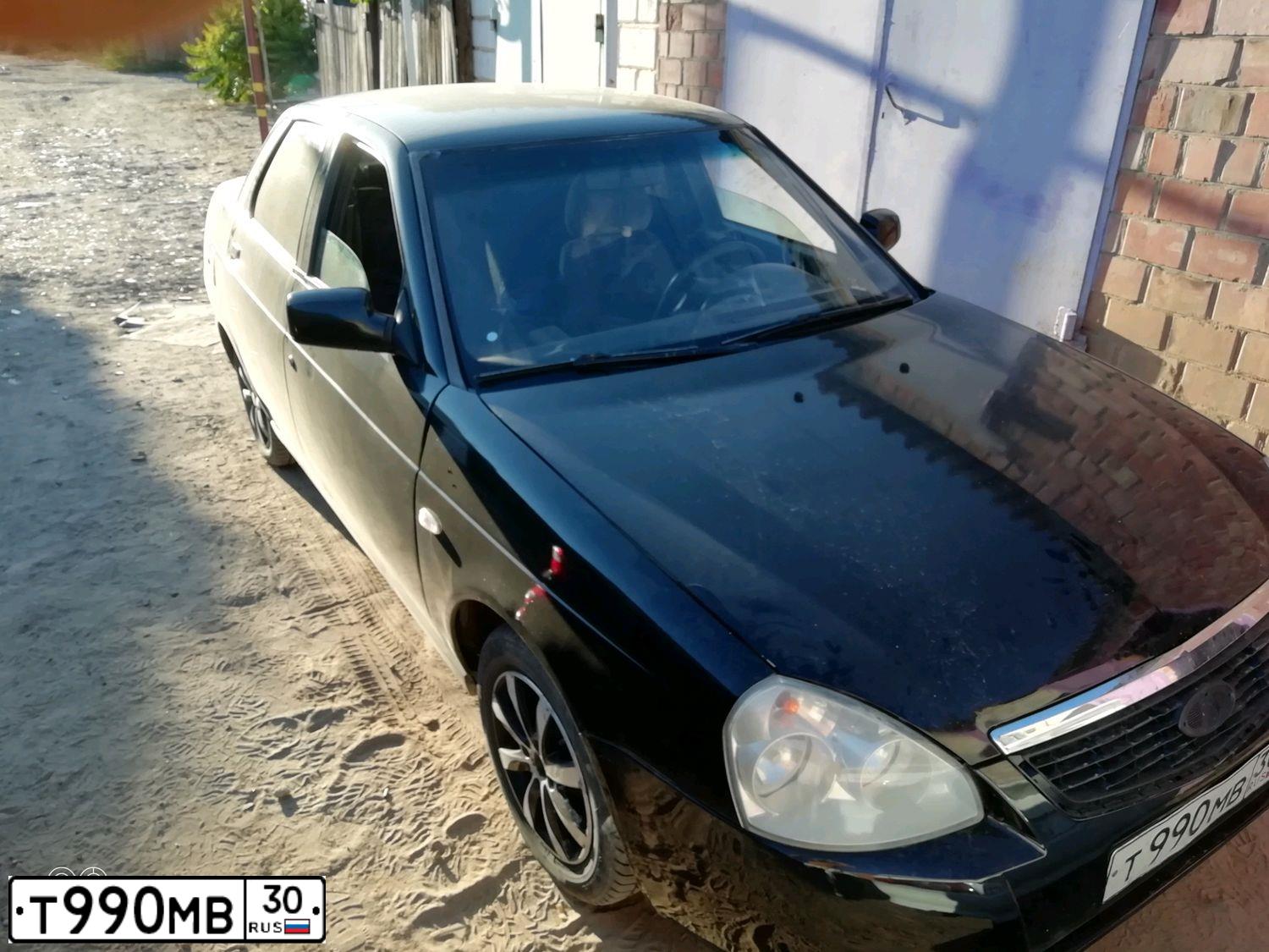 Фото автомобиля LADA 2170 PRIORA, 2007 — госномер Т990МВ30. Цвет: СИНЕ-ЧЕРНЫЙ