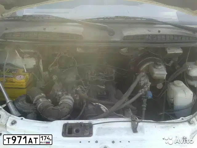 Фото автомобиля GAZ 3302 EL, 2004 — госномер Т971АТ174. Цвет: СНЕЖНО-БЕЛЫЙ