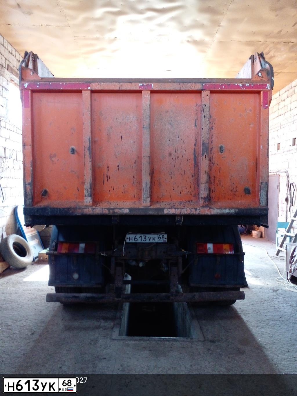 Фото автомобиля KAMAZ 6520 /6X4/, 2011 — госномер А778НН134. Цвет: ОРАНЖЕВЫЙ
