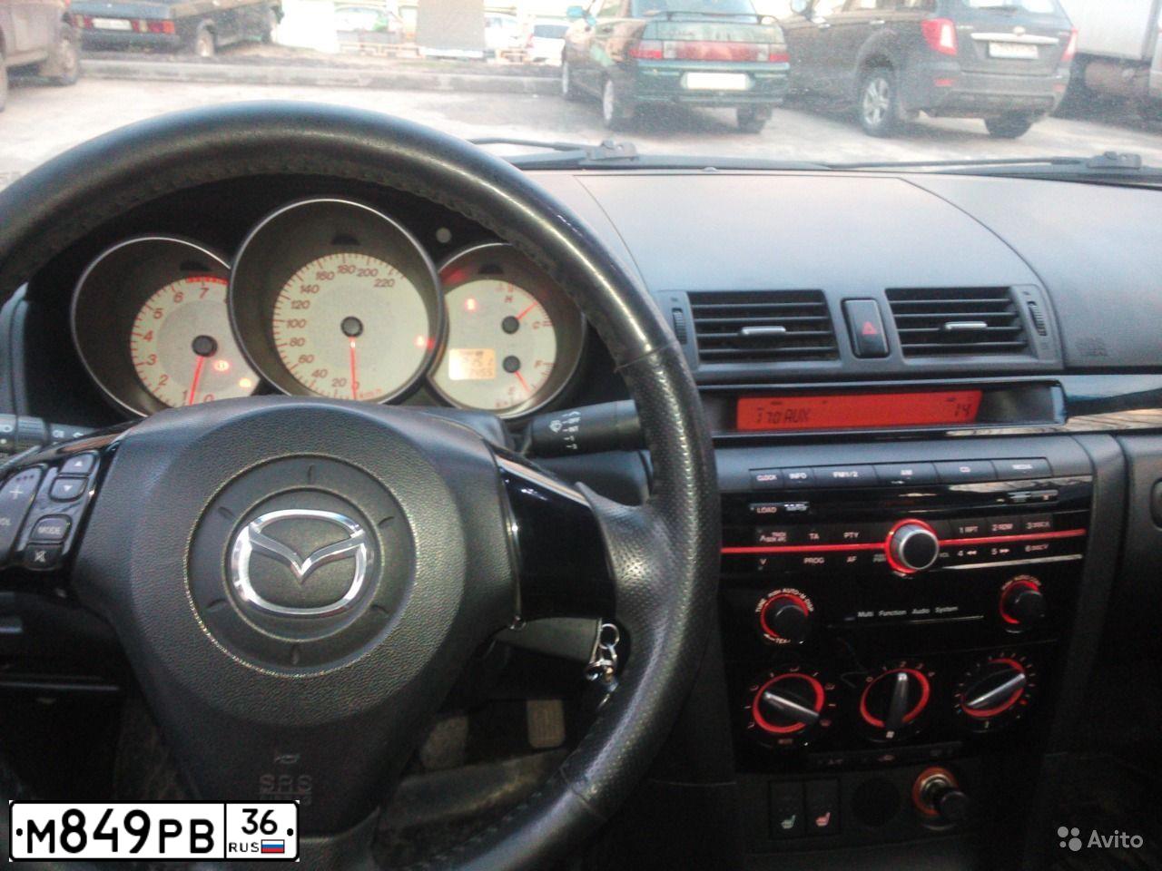 Фото автомобиля MAZDA 3, 2008 — госномер М849РВ36. Цвет: Серый