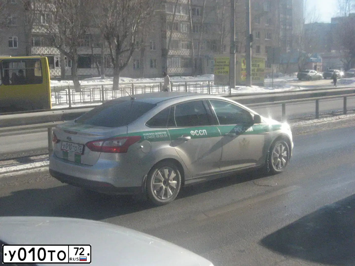 Фото автомобиля FORD FOCUS, 2011 — госномер У010ТО72. Цвет: Серебристый