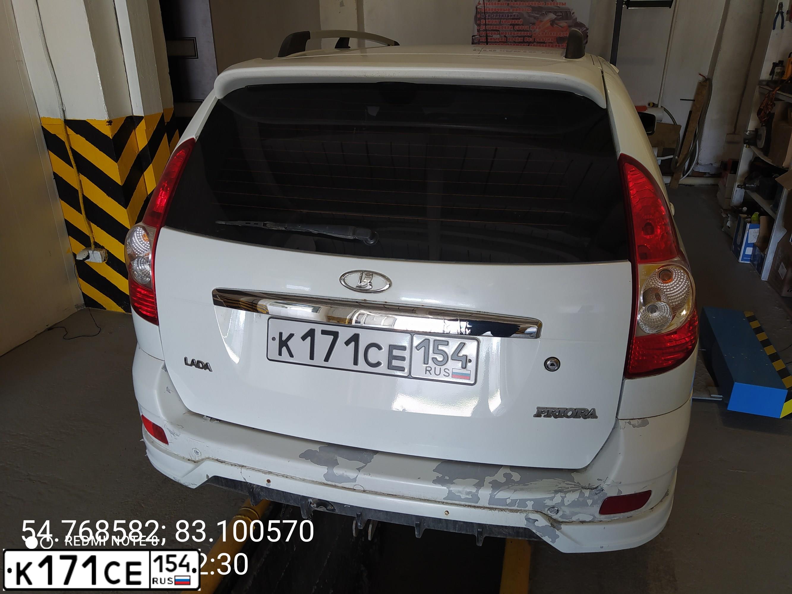 Фото автомобиля LADA 2171 PRIORA, 2011 — госномер А169НН28. Цвет: Белый