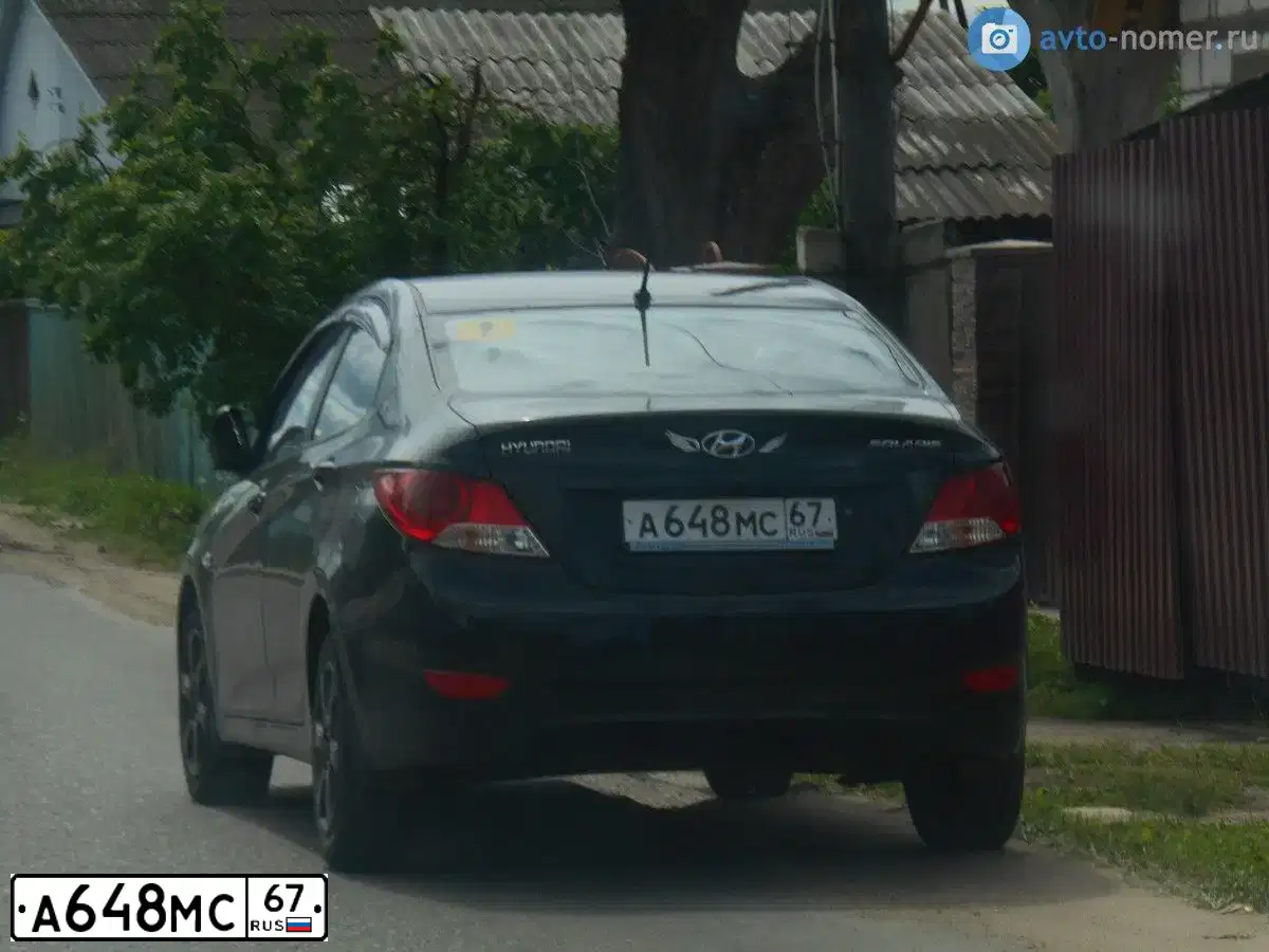 Фото автомобиля HYUNDAI SOLARIS, 2012 — госномер А648МС67. Цвет: ЧЕРНЫЙ