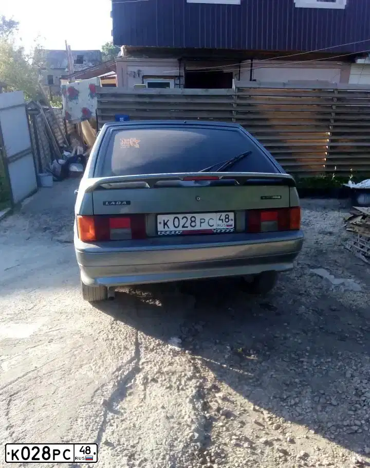 Фото автомобиля LADA 2114 SAMARA, 2007 — госномер У093НК150. Цвет: СЕРО-ЗЕЛЕНЫЙ