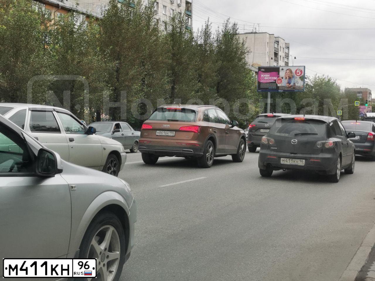 Фото автомобиля MAZDA 3, 2008 — госномер М411КН96. Цвет: ЧЕРНЫЙ