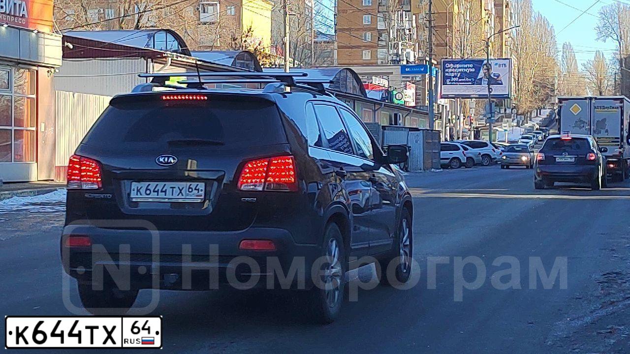 Фото автомобиля KIA SORENTO, 2012 — госномер К644ТХ64. Цвет: ЧЕРНЫЙ