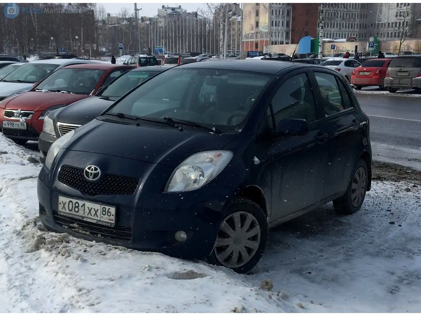 Фото автомобиля KIA RIO, 2010 — госномер Н998ТЕ86. Цвет: КРАСНЫЙ