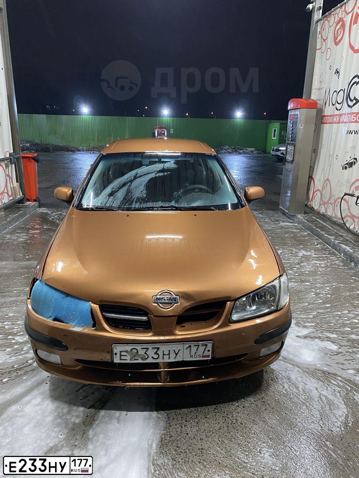 Фото автомобиля NISSAN ALMERA, 2000 — госномер Е233НУ177. Цвет: КОРИЧНЕВЫЙ