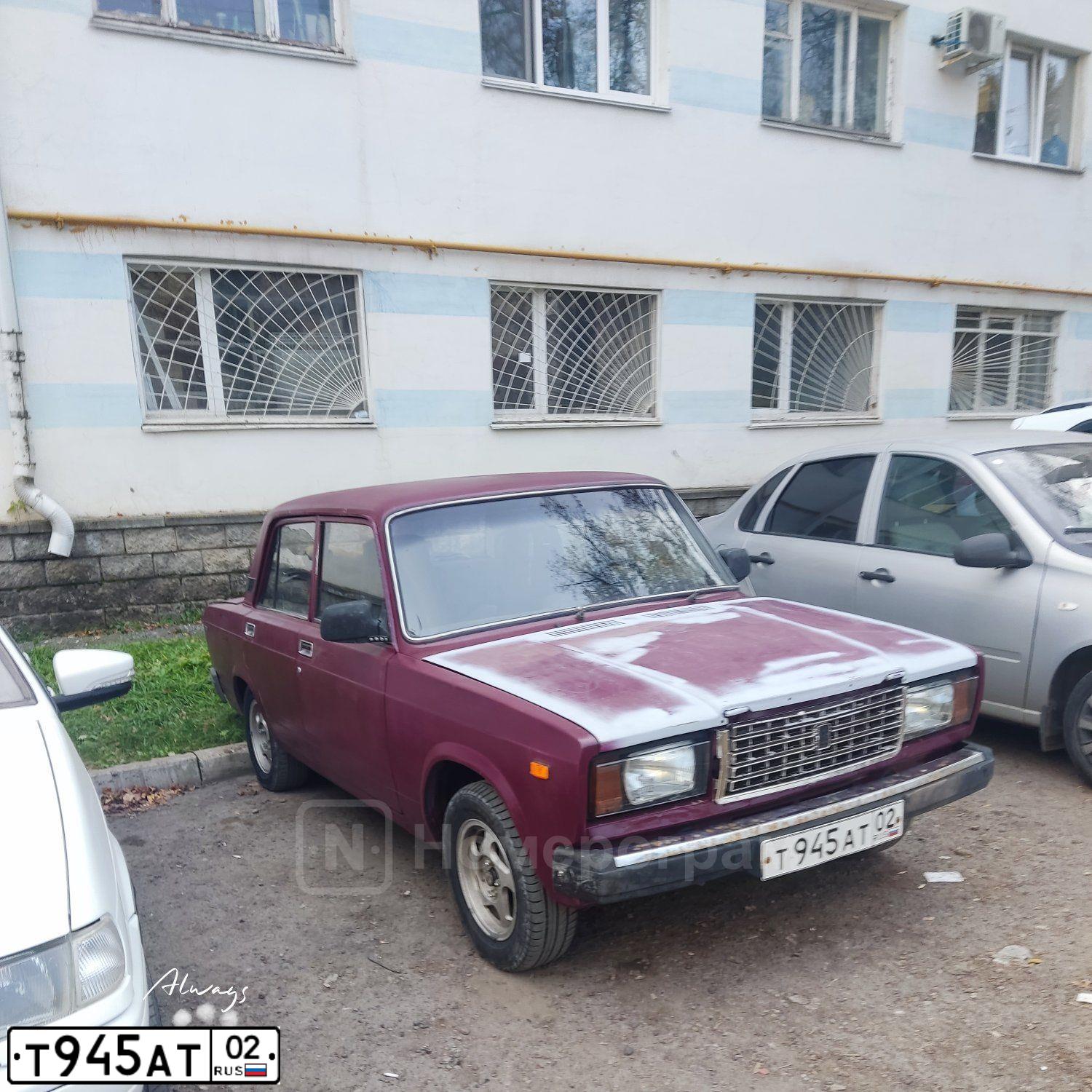 Фото автомобиля LADA 2107, 2003 — госномер Т945АТ02. Цвет: ТЕМНО-БОРДОВЫЙ