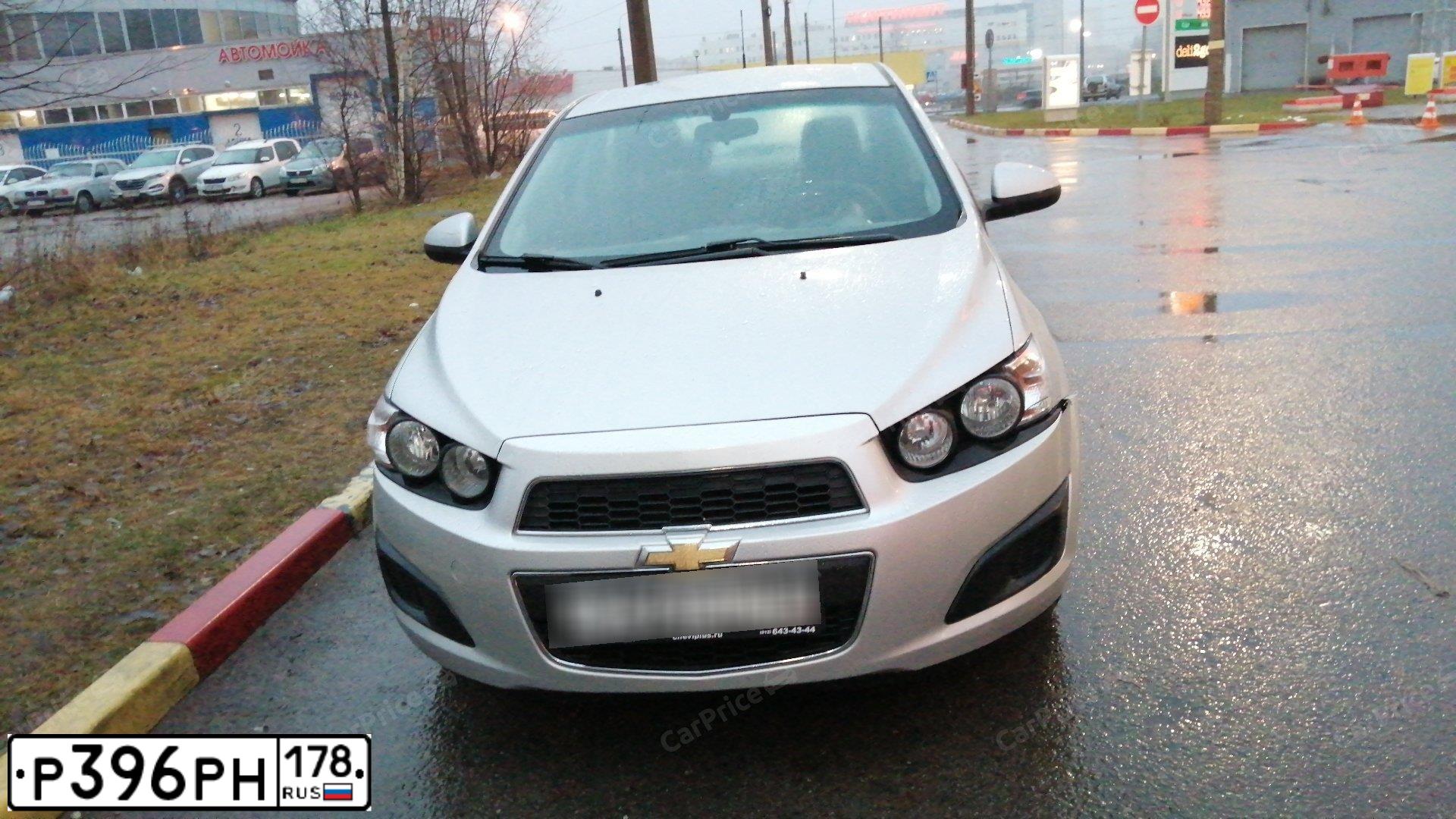 Фото автомобиля CHEVROLET AVEO, 2013 — госномер Р396РН178. Цвет: СЕРЕБРИСТЫЙ МЕТАЛЛИК