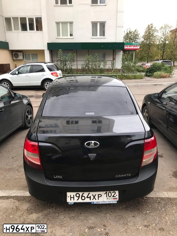 Фото автомобиля LADA GRANTA, 2012 — госномер Е201СХ156. Цвет: СЕРО-ЧЕРНЫЙ