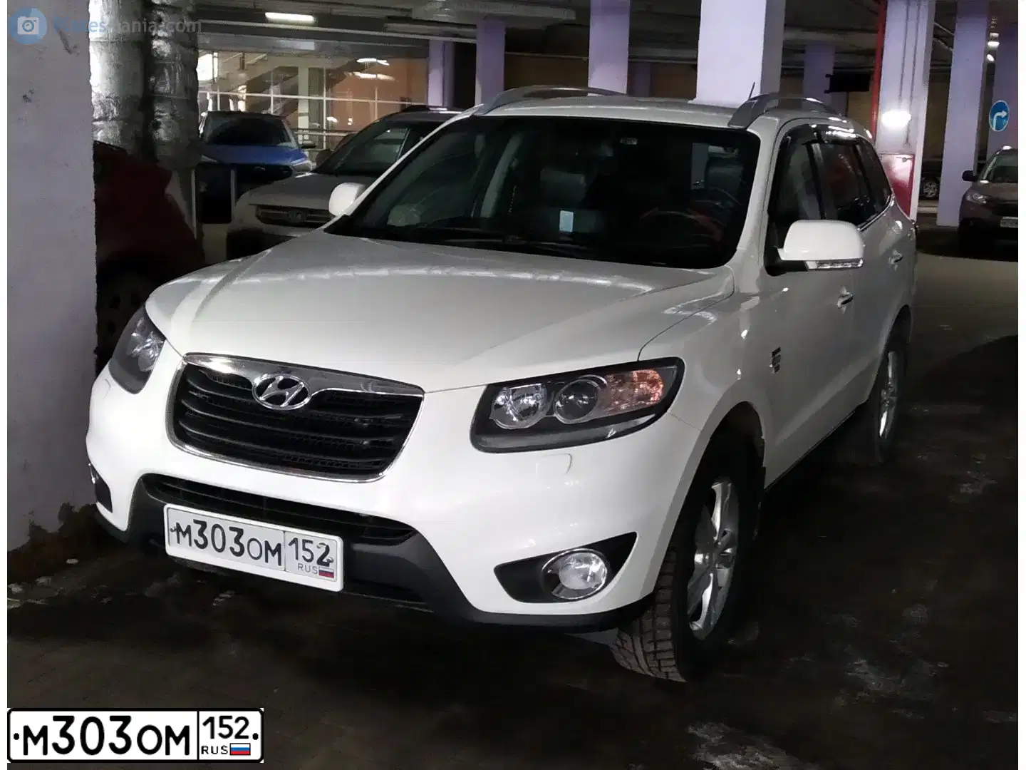 Фото автомобиля HYUNDAI SANTA FE, 2010 — госномер М303ОМ152. Цвет: Белый
