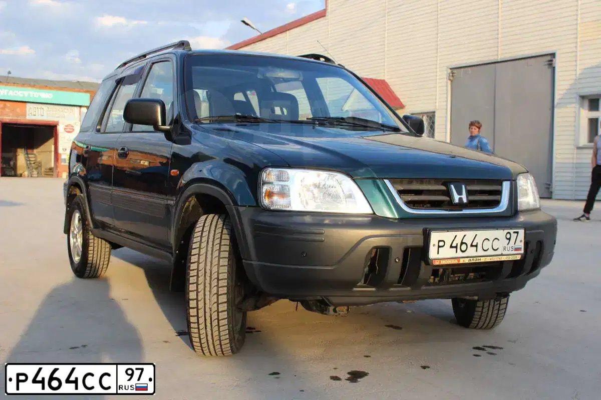 Фото автомобиля HONDA CR-V, 1997 — госномер С058ОР70. Цвет: ЗЕЛЕНЫЙ