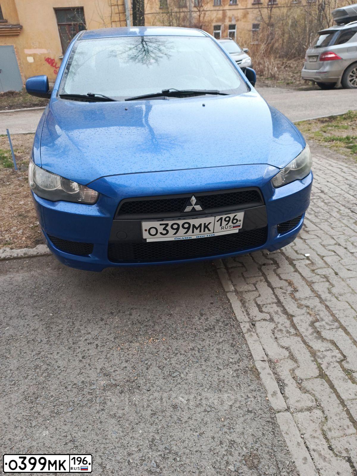 Фото автомобиля MITSUBISHI LANCER, 2008 — госномер О399МК196. Цвет: синий