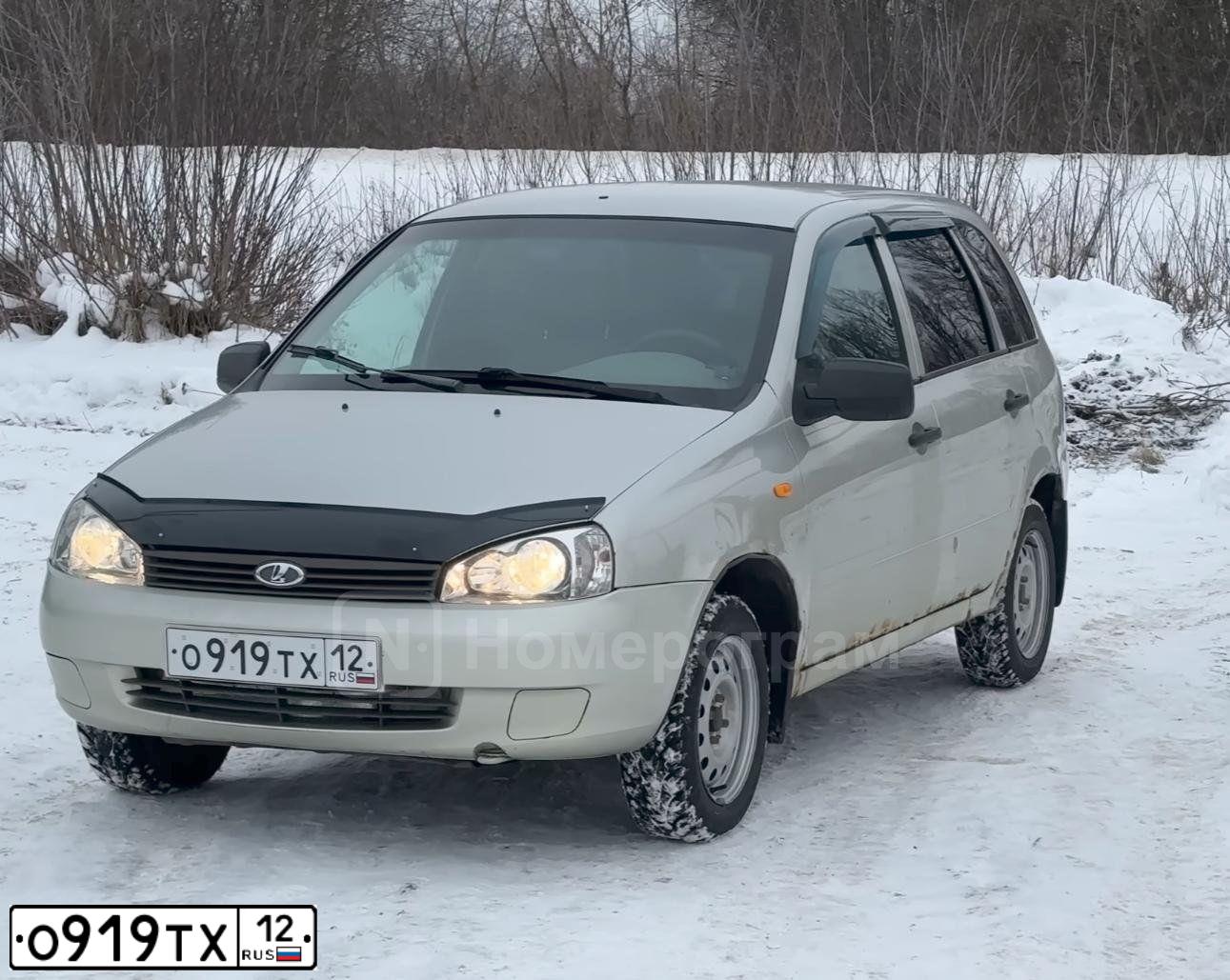 Фото автомобиля LADA 1117 KALINA, 2011 — госномер О919ТХ12. Цвет: БЕЛО-ЖЕЛТЫЙ ПЕРЛАМУТРОВЫЙ
