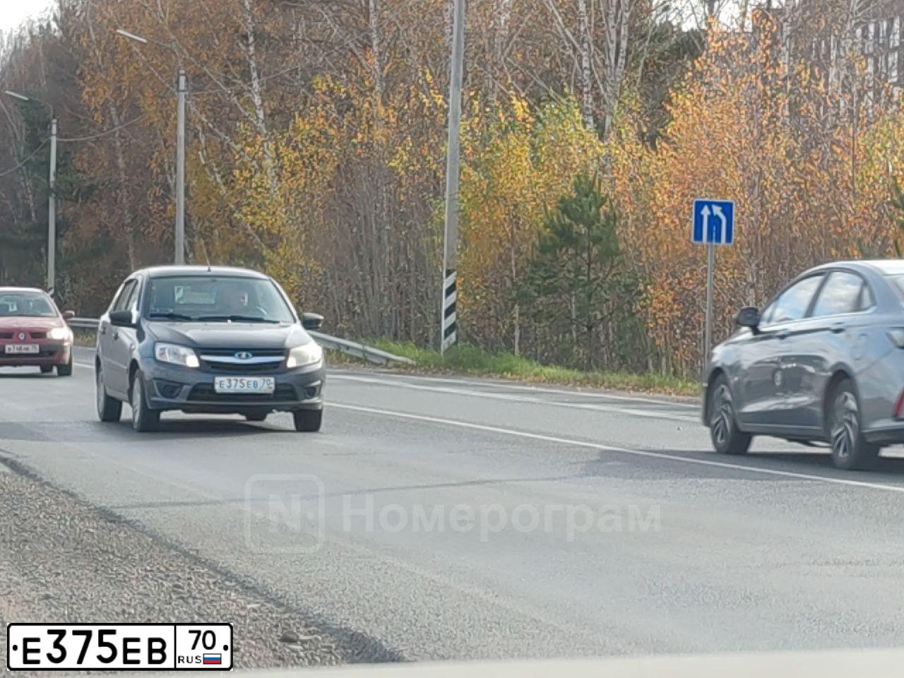 Фото автомобиля LADA 2191 GRANTA, 2017 — госномер Е375ЕВ70. Цвет: ТЕМНО-СЕРЫЙ