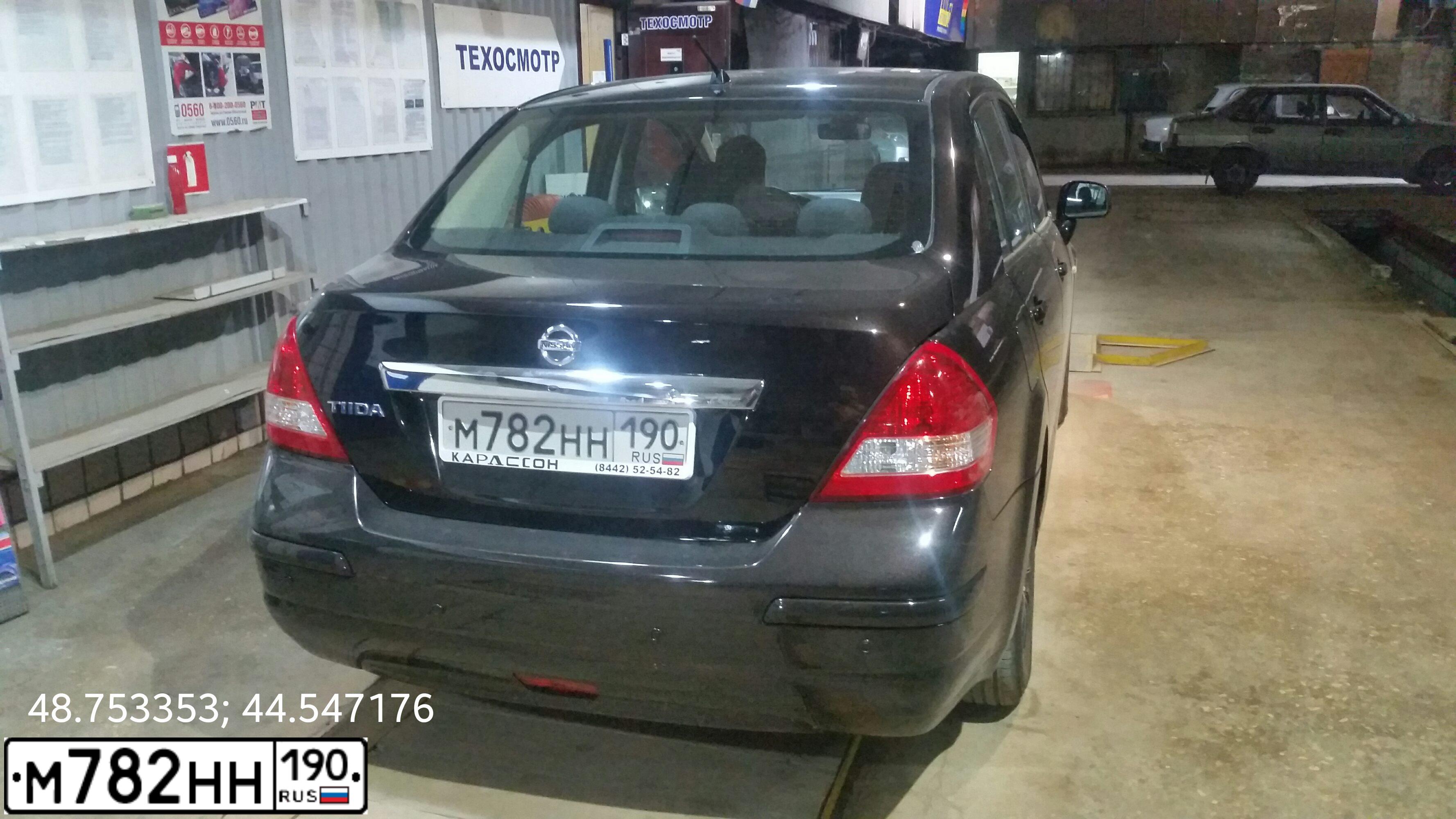 Фото автомобиля NISSAN TIIDA, 2010 — госномер К124НМ134. Цвет: Коричневый