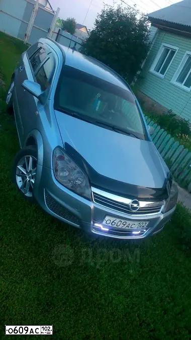 Фото автомобиля OPEL ASTRA, 2008 — госномер М658ВК82. Цвет: Серый