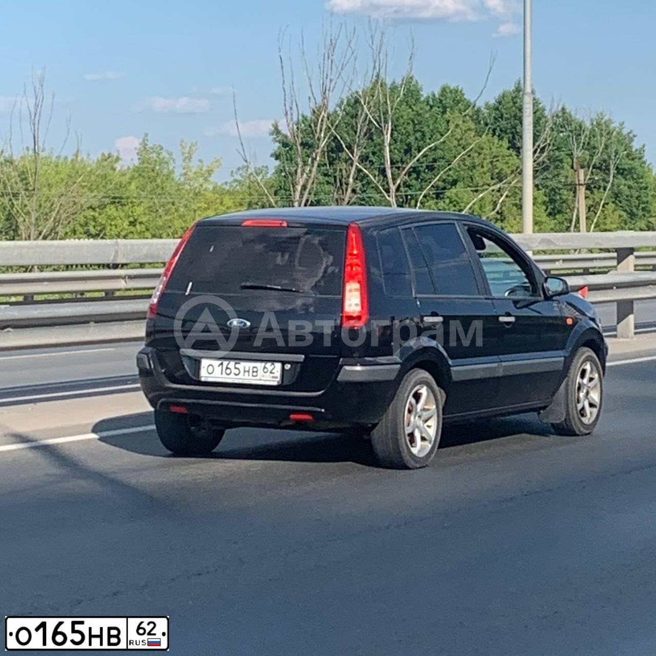 Фото автомобиля FORD FUSION, 2007 — госномер О165НВ62. Цвет: ЧЕРНЫЙ