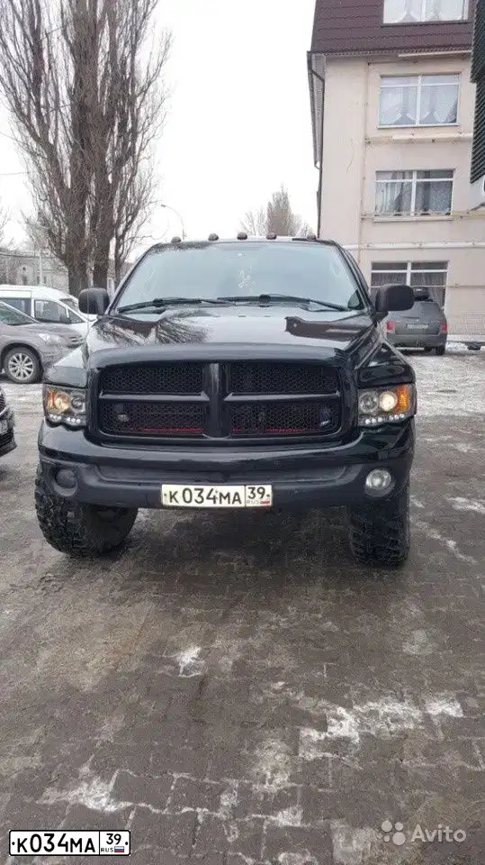 Фото автомобиля DODGE RAM, 2005 — госномер С518УА39. Цвет: ЧЕРНЫЙ
