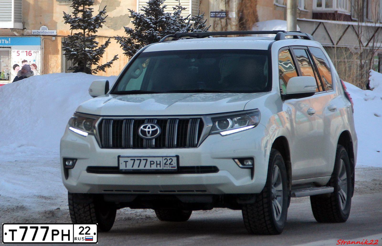 Фото автомобиля TOYOTA RAV4, 2013 — госномер Е616КО154. Цвет: бронзовый