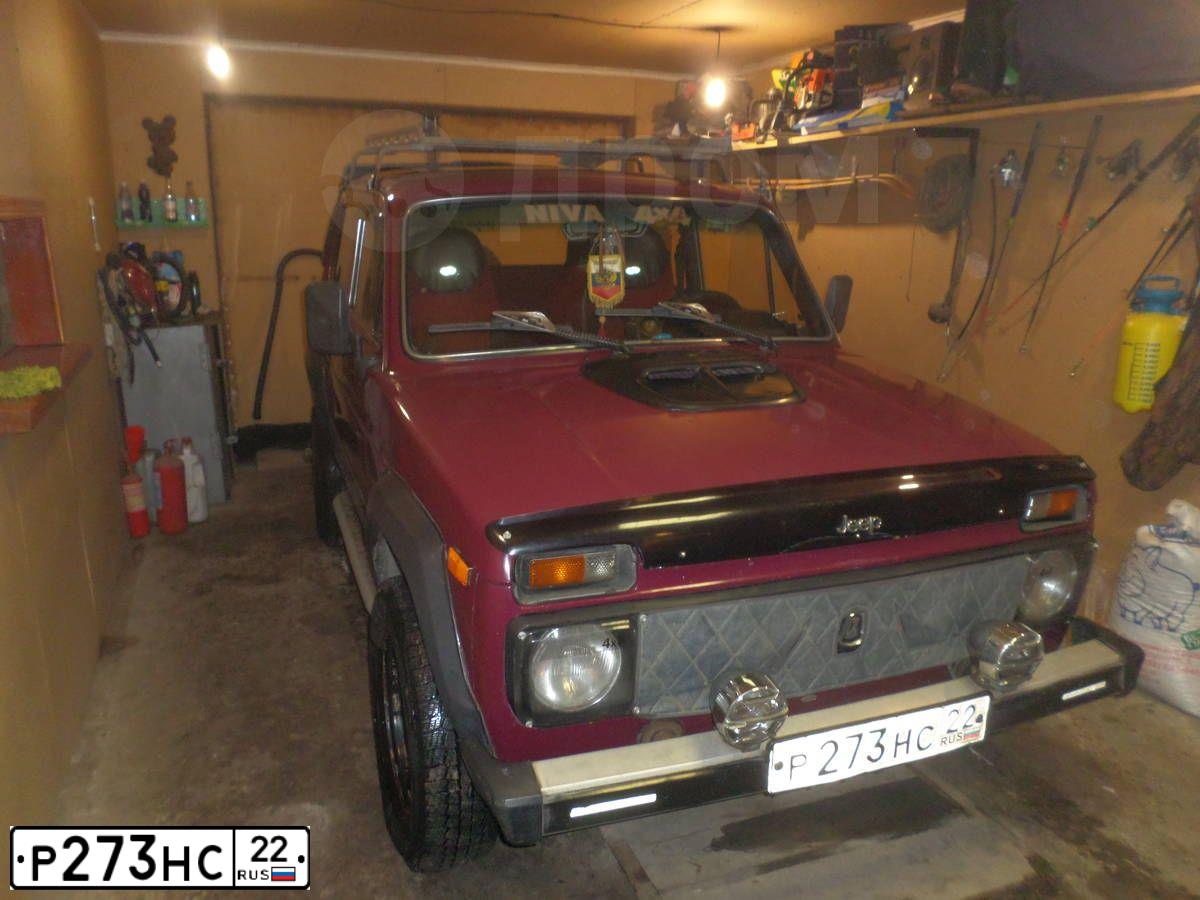 Фото автомобиля LADA NIVA, 1996 — госномер В696ХЕ122. Цвет: Красный
